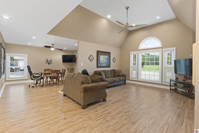 99 Jacey Blake Dr, Calvert City, KY 42029 - living area featuring a ceiling fan, light wood-style flooring, high vaulted ceiling, baseboards, and recessed lighting
