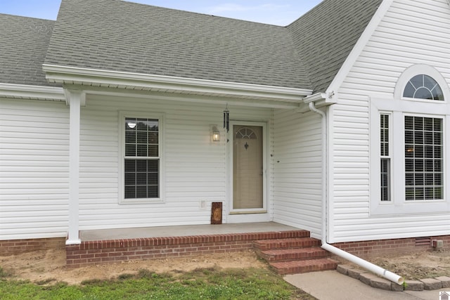99 Jacey Blake Dr, Calvert City, KY 42029 - property entrance with roof with shingles and a porch