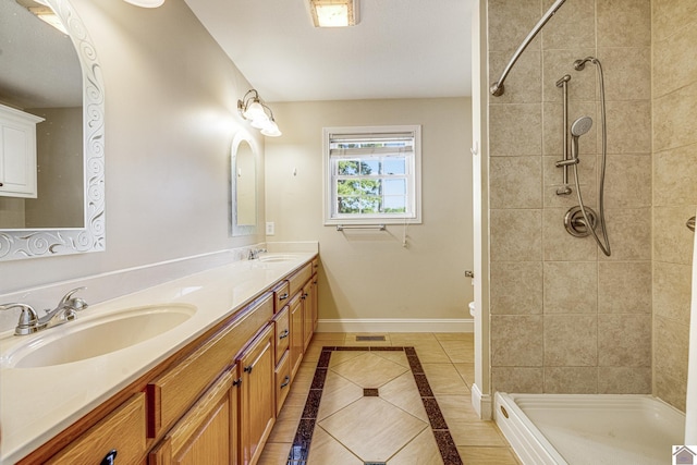 54 Grove Ln, Murray, KY 42071 - full bathroom featuring baseboards, double vanity, a tile shower, toilet, and tile patterned flooring