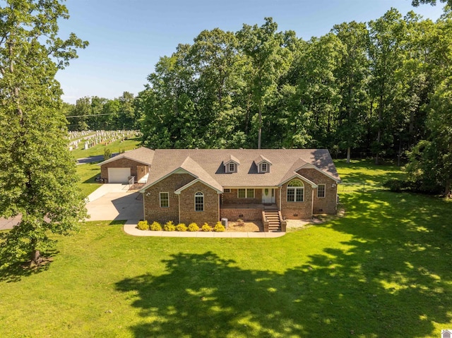 54 Grove Ln, Murray, KY 42071 - view of front facade featuring brick siding, a front lawn, driveway, and crawl space