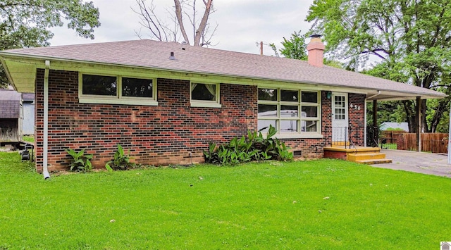 650 Cypress Cir, Calvert City, KY 42029 - ranch-style house featuring a chimney, brick siding, and roof with shingles