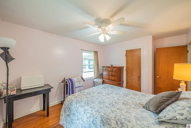 650 Cypress Cir, Calvert City, KY 42029 - bedroom featuring light wood-type flooring, baseboards, a closet, and ceiling fan