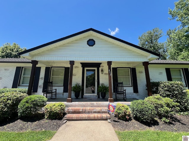 802 S 17th St, Murray, KY 42071 - view of front facade with brick siding and a porch
