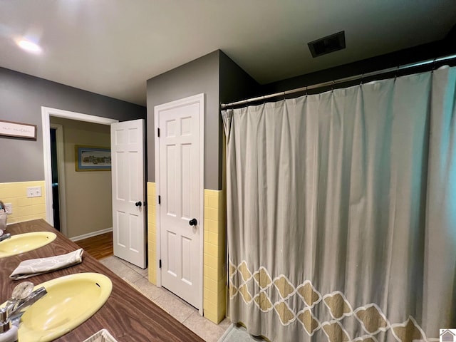 802 S 17th St, Murray, KY 42071 - bathroom with tile patterned flooring, double vanity, and a shower with curtain