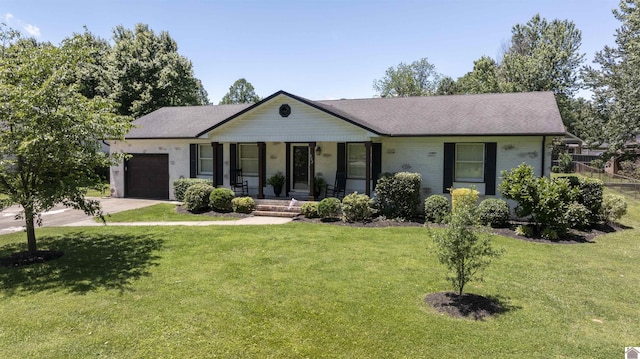 802 S 17th St, Murray, KY 42071 - single story home with a porch, an attached garage, a front yard, and concrete driveway