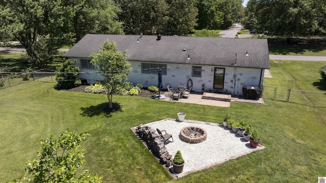 802 S 17th St, Murray, KY 42071 - back of property featuring a fire pit, a patio, and brick siding