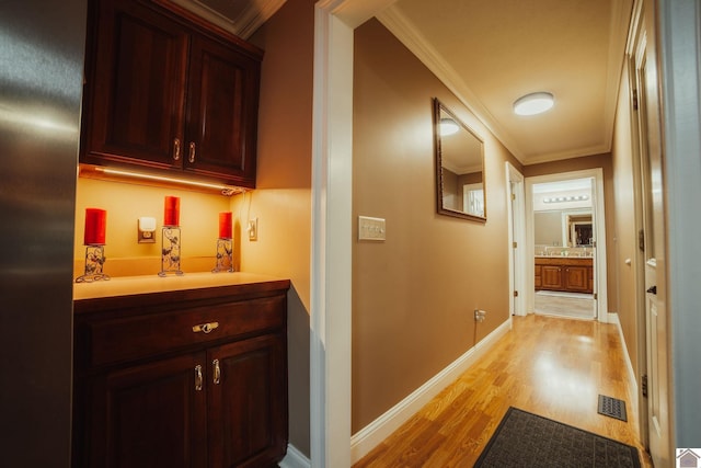 2878 State Route 303, Mayfield, KY 42066 - hall with light wood-style floors, ornamental molding, and baseboards