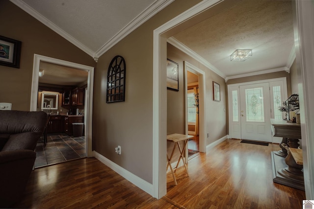 2878 State Route 303, Mayfield, KY 42066 - foyer entrance featuring wood finished floors, a textured ceiling, baseboards, and ornamental molding