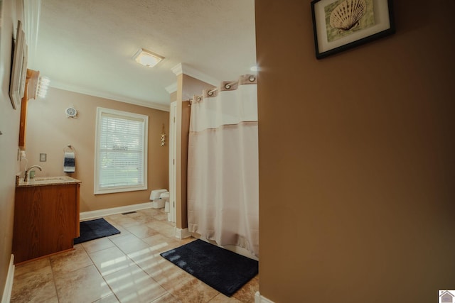 2878 State Route 303, Mayfield, KY 42066 - full bathroom with ornamental molding, vanity, toilet, a shower with curtain, and baseboards