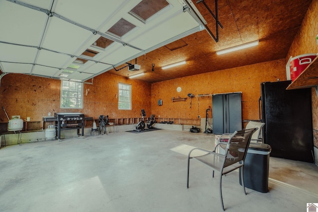 2878 State Route 303, Mayfield, KY 42066 - garage featuring a garage door opener and a workshop area