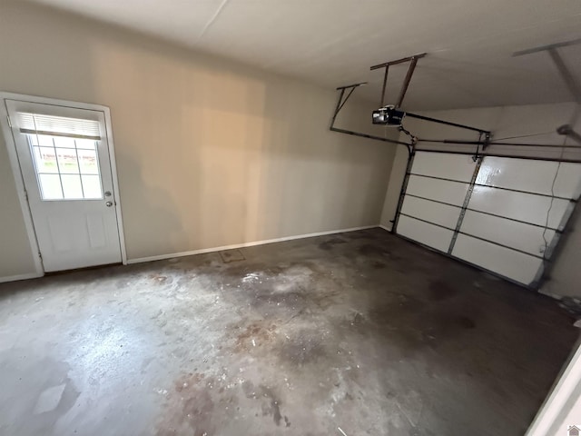 303 Union Cir, Mayfield, KY 42066 - garage with a garage door opener and baseboards