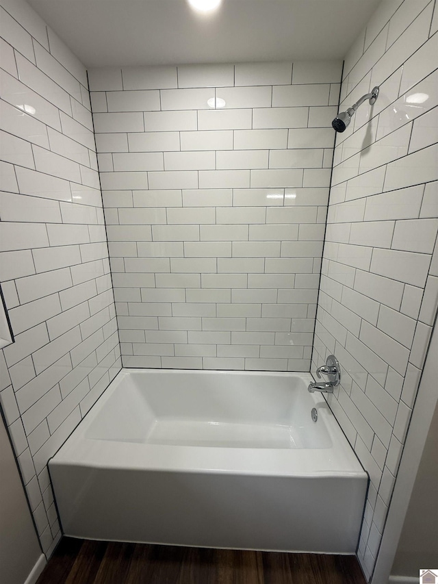 303 Union Cir, Mayfield, KY 42066 - bathroom featuring wood finished floors and shower / bathtub combination