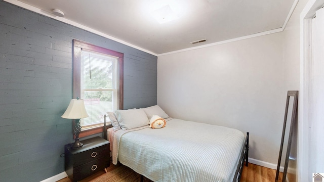 705 Story Ave, Murray, KY 42071 - bedroom featuring wood finished floors, baseboards, and ornamental molding
