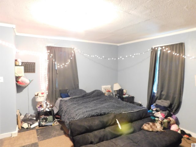 2837 Tennessee, Paducah, KY 42003 - carpeted bedroom featuring ornamental molding and a textured ceiling