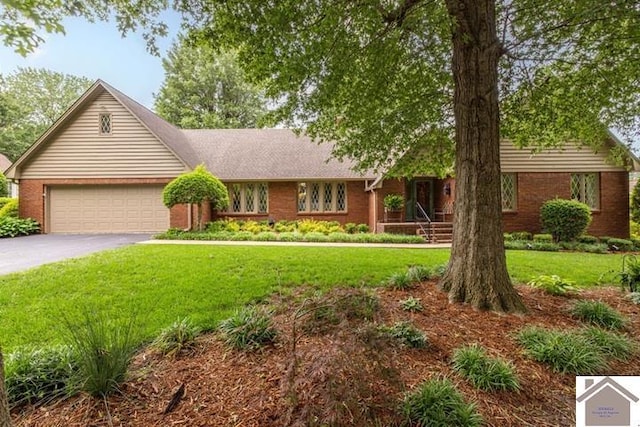 203 Golf Club Ln, Mayfield, KY 42066 - ranch-style house featuring asphalt driveway, a front yard, brick siding, and an attached garage