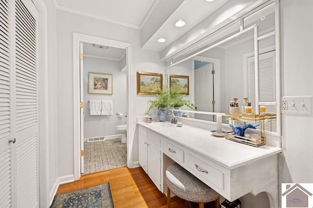 203 Golf Club Ln, Mayfield, KY 42066 - bathroom featuring a closet, toilet, wood finished floors, vanity, and crown molding