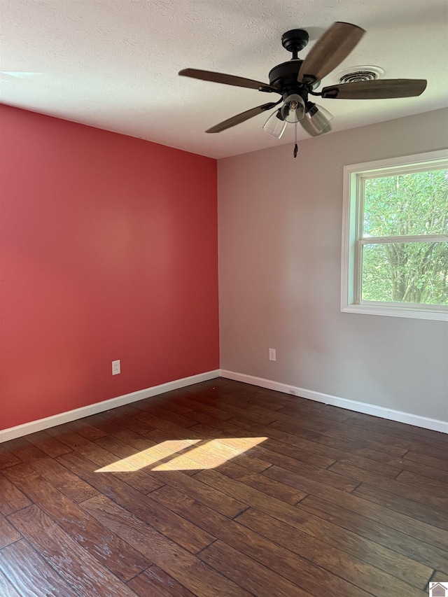 7740 Old Mayfield Rd, Paducah, KY 42003 - spare room with hardwood / wood-style floors, baseboards, a ceiling fan, and a textured ceiling