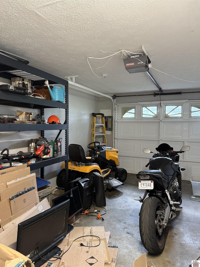 7740 Old Mayfield Rd, Paducah, KY 42003 - garage featuring a garage door opener