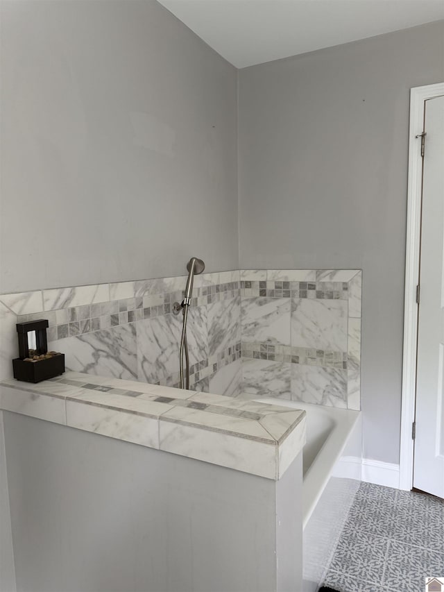7740 Old Mayfield Rd, Paducah, KY 42003 - bathroom with a bath and baseboards