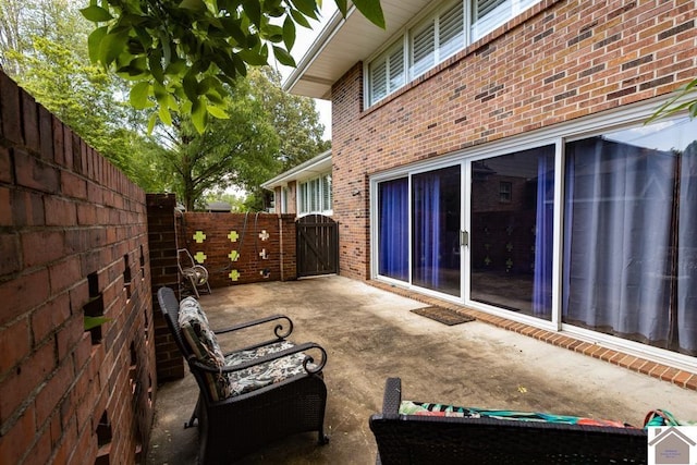 1218 Dogwood, Murray, KY 42071 - fenced backyard featuring a gate, a patio, and french doors