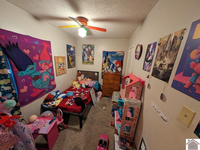 922 S 27th St, Paducah, KY 42003 - bedroom with a textured ceiling, carpet, and ceiling fan
