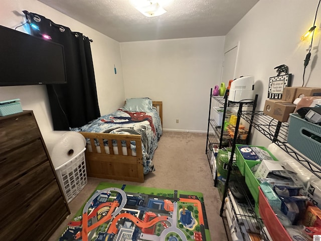 535 Leeds Dr, Paducah, KY 42003 - bedroom with carpet floors and a textured ceiling