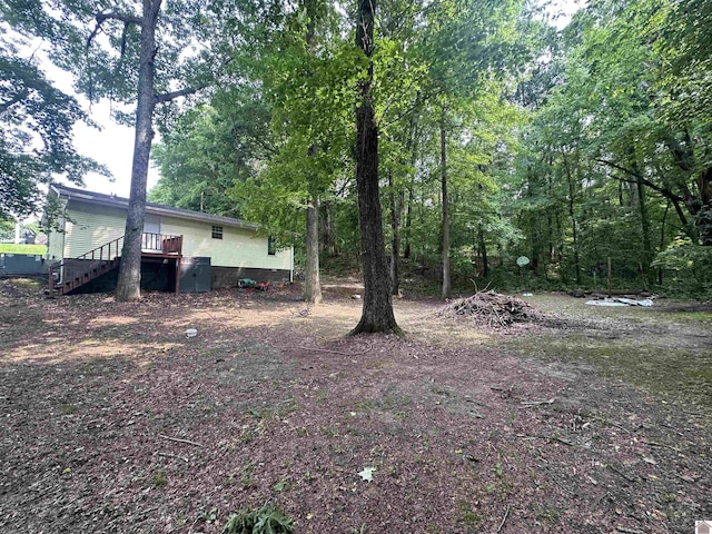 535 Leeds Dr, Paducah, KY 42003 - view of yard featuring stairway and a deck