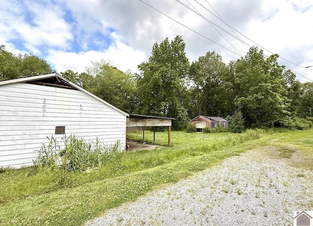 2130 Husband Rd, Paducah, KY 42003 - view of yard featuring a carport