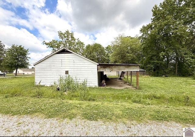 2130 Husband Rd, Paducah, KY 42003 - view of side of home featuring a carport