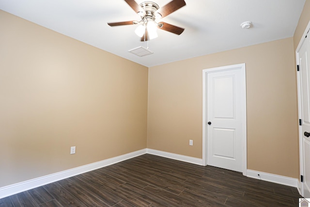 205 Clover Cres, Paducah, KY 42003 - spare room featuring baseboards, dark wood-type flooring, ceiling fan, and a smoke detector