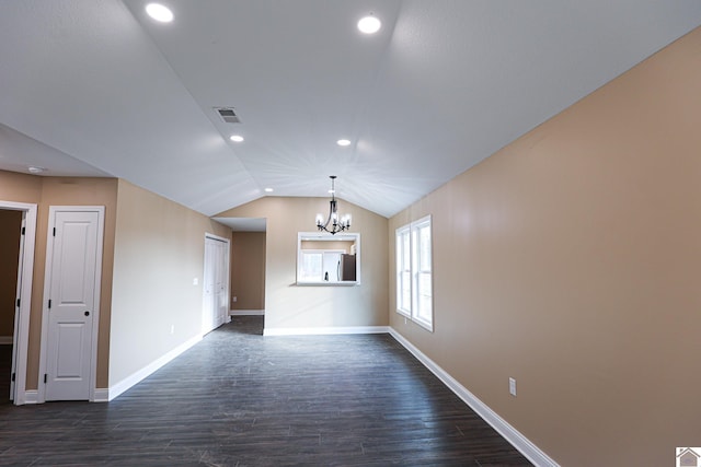 205 Clover Cres, Paducah, KY 42003 - empty room with a chandelier, dark wood-type flooring, baseboards, vaulted ceiling, and recessed lighting