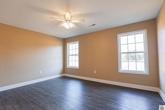 205 Clover Cres, Paducah, KY 42003 - spare room with baseboards, ceiling fan, and dark wood finished floors