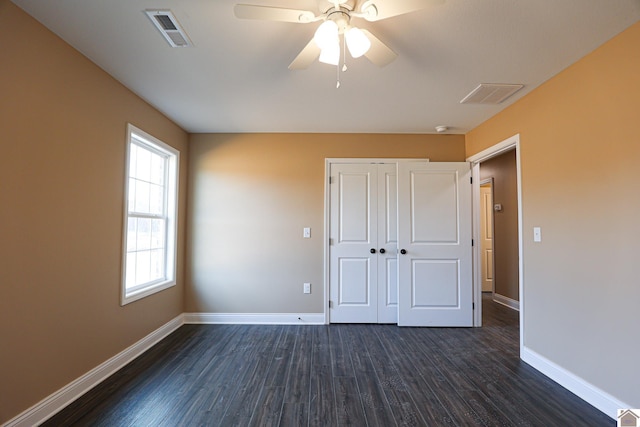 205 Clover Cres, Paducah, KY 42003 - unfurnished bedroom featuring baseboards, dark wood-style flooring, a closet, and ceiling fan