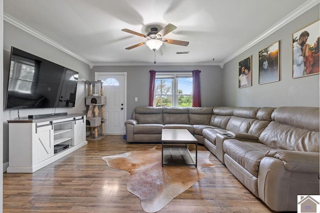 1667 Irvin Cobb Rd, Murray, KY 42071 - living area with ceiling fan, wood finished floors, and crown molding