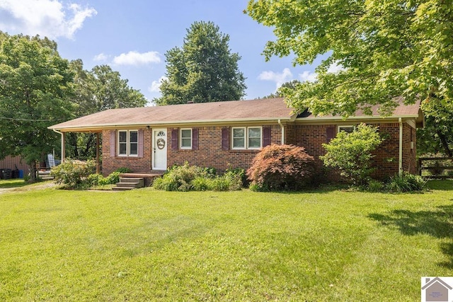 1667 Irvin Cobb Rd, Murray, KY 42071 - single story home featuring a front yard and brick siding