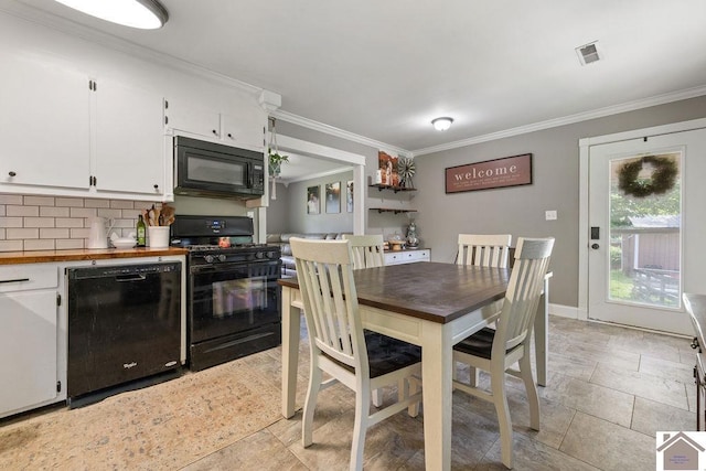 1667 Irvin Cobb Rd, Murray, KY 42071 - dining area featuring crown molding and baseboards
