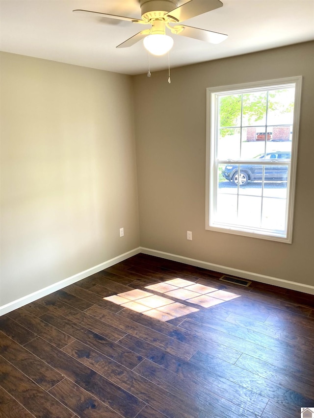 1783 Radio Rd, Almo, KY 42020 - spare room with dark wood finished floors, baseboards, and a ceiling fan
