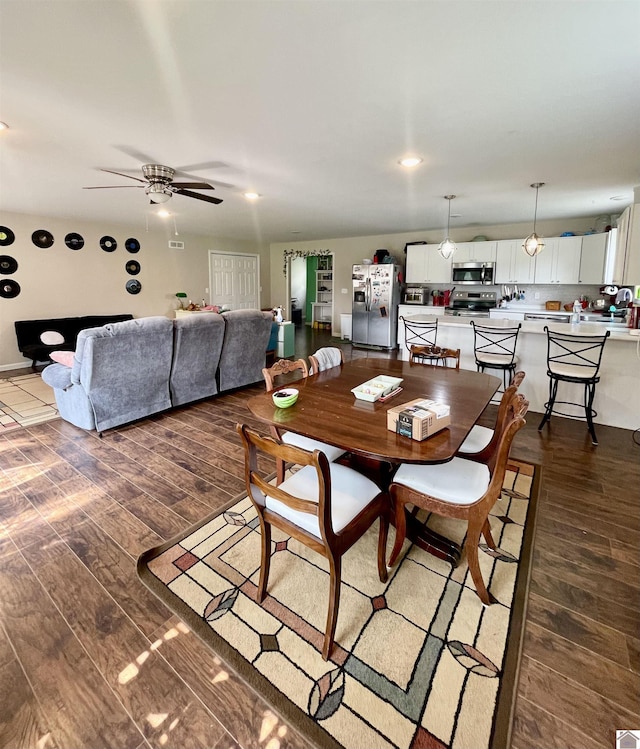 1783 Radio Rd, Almo, KY 42020 - dining room with a ceiling fan and wood finished floors