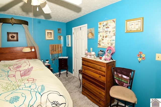 250 Jan Ann Dr, Paducah, KY 42003 - carpeted bedroom featuring a textured ceiling, ceiling fan, and baseboards