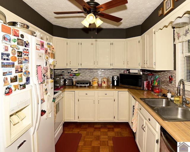 250 Jan Ann Dr, Paducah, KY 42003 - kitchen with white appliances, a sink, a ceiling fan, a textured ceiling, and decorative backsplash