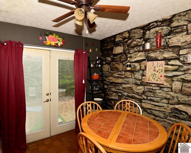 250 Jan Ann Dr, Paducah, KY 42003 - dining space featuring a textured ceiling, french doors, and ceiling fan