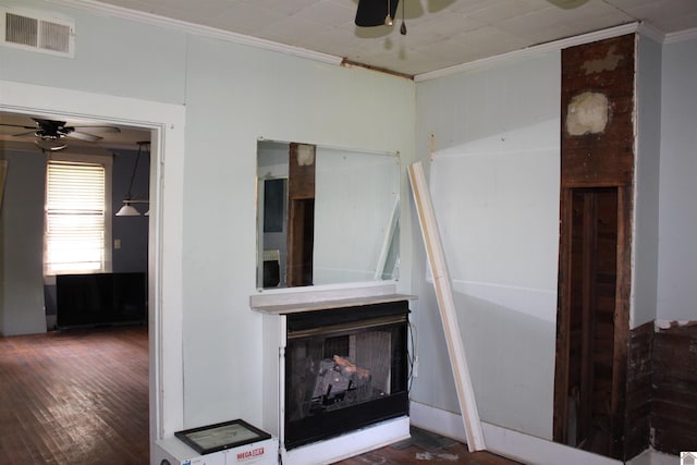 4045 Husband Rd, Paducah, KY 42003 - unfurnished living room with ceiling fan, ornamental molding, and wood finished floors