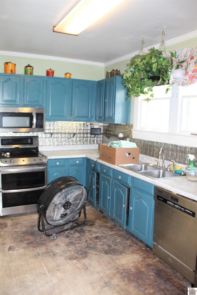 4045 Husband Rd, Paducah, KY 42003 - kitchen featuring appliances with stainless steel finishes, blue cabinets, a sink, tasteful backsplash, and light countertops