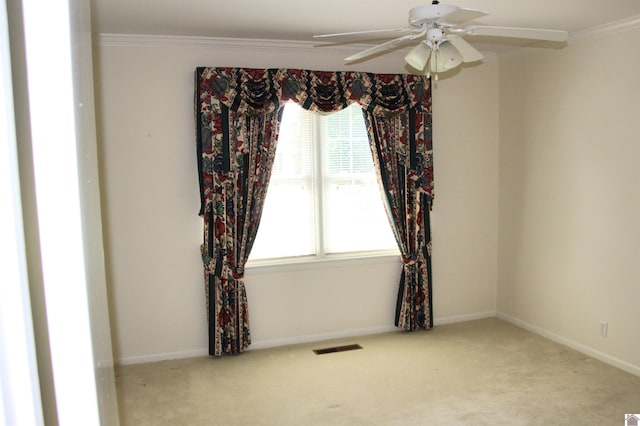 156 Albany, Paducah, KY 42003 - carpeted empty room featuring a ceiling fan, ornamental molding, healthy amount of natural light, and baseboards