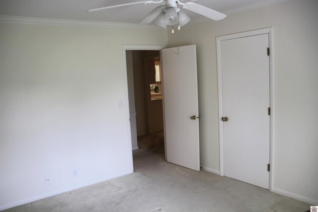 156 Albany, Paducah, KY 42003 - unfurnished bedroom featuring light colored carpet, ornamental molding, baseboards, and a ceiling fan