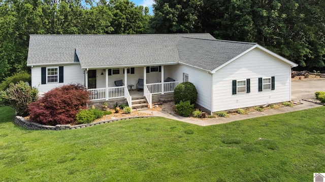 68 Lazy K Ln, Kuttawa, KY 42055 - ranch-style house featuring a porch, a front lawn, and a shingled roof