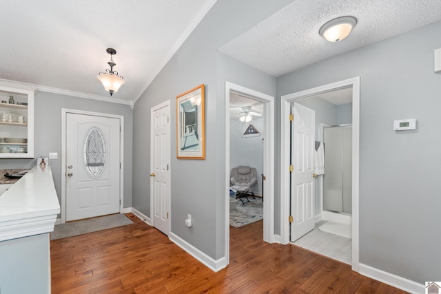 68 Lazy K Ln, Kuttawa, KY 42055 - entrance foyer featuring light wood-style flooring, a ceiling fan, baseboards, and ornamental molding