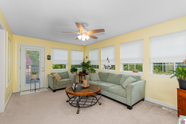 68 Lazy K Ln, Kuttawa, KY 42055 - living area with a ceiling fan, light colored carpet, and baseboards