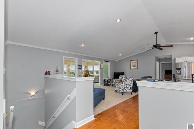68 Lazy K Ln, Kuttawa, KY 42055 - living room with crown molding, ceiling fan, vaulted ceiling, light wood finished floors, and baseboards