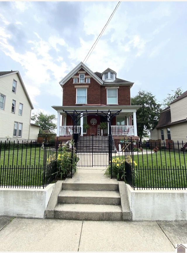 1722 Jefferson St, Paducah, KY 42001 - view of front of house with a porch and brick siding